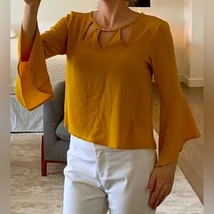 Yellow flowy blouse